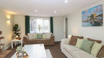 Ferienhaus | Wohnbereich | Fernseher