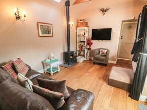 Cottage | Ruang keluarga | TV dan pemutar DVD