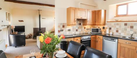 Cottage | Private kitchen | Stovetop, dishwasher, highchair, cookware/dishes/utensils