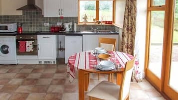Cottage | Private kitchen | Highchair, cookware/dishes/utensils