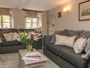 Cottage | Woonkamer | Een open haard