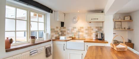 Cottage | Private kitchen | Microwave, stovetop, dishwasher, highchair
