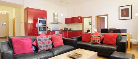 Flat-screen TV, video game console, books