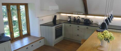 Cottage | Private kitchen | Fridge, microwave, stovetop, dishwasher