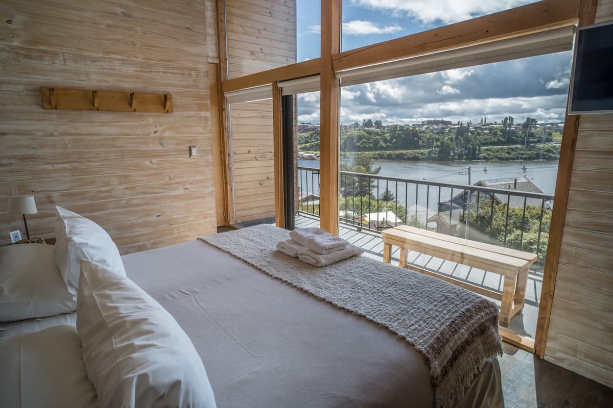 deluxe suite, 1 king bed, terrace, bay view | premium bedding, in-room safe, desk, soundproofing