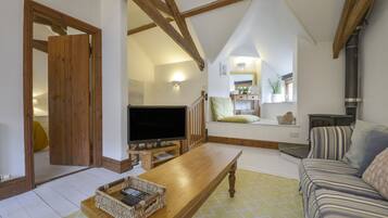 Cottage | Area keluarga | TV, pemutar DVD, dan meja tenis meja