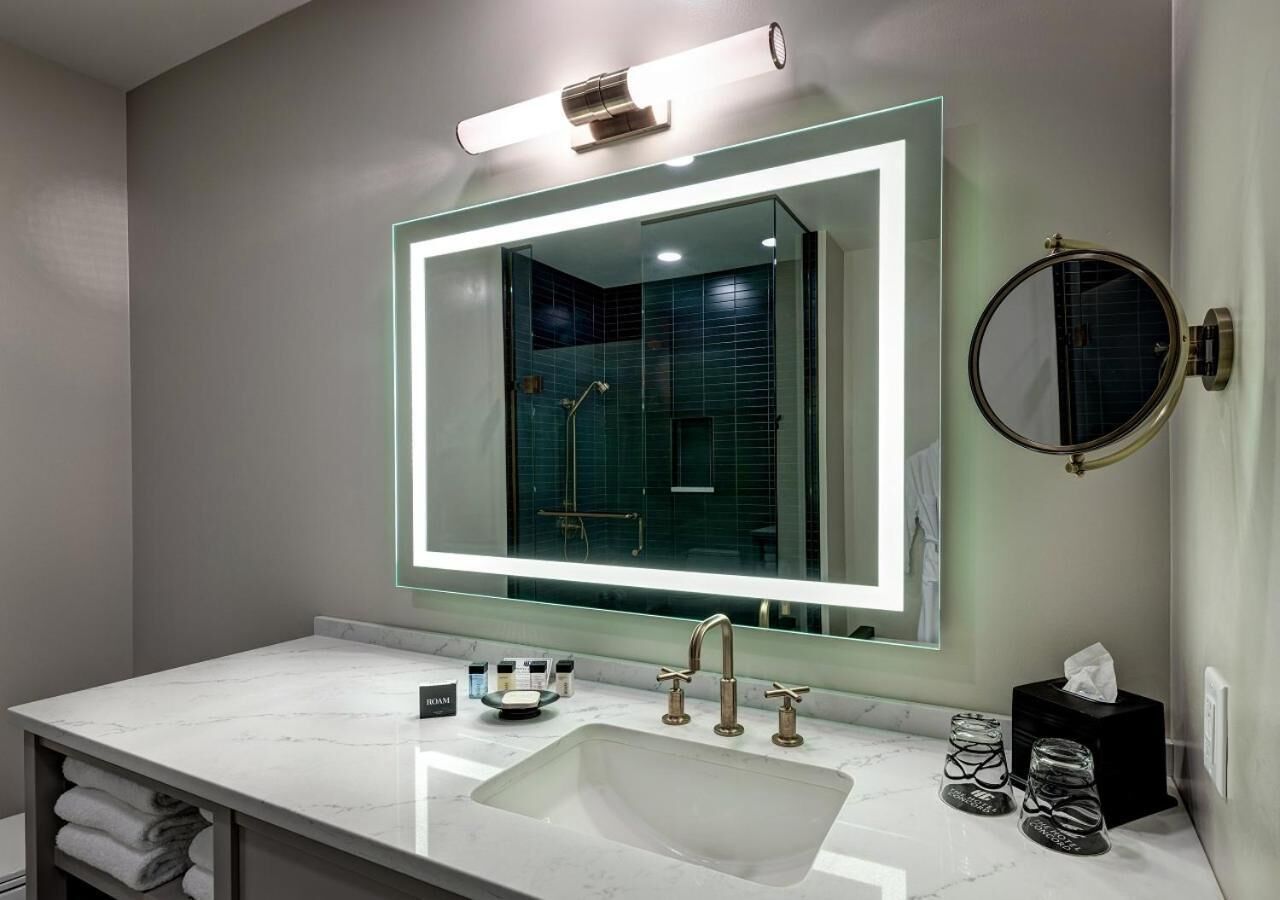 shower, designer toiletries, hair dryer, bathrobes