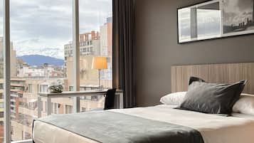 In-room safe, desk, laptop workspace, blackout curtains