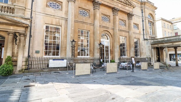 A historic building with classical architecture, featuring large windows and a prominent entrance. - 33 Crescent Gardens (Bath)