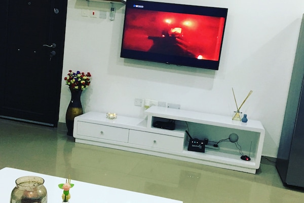 Classic Apartment, 1 Bedroom | Living room | Flat-screen TV