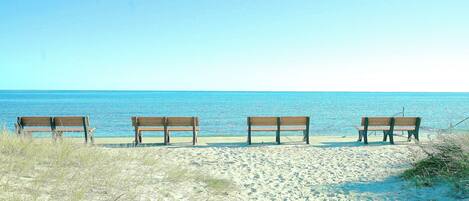 On the beach, sun loungers, beach umbrellas, beach towels