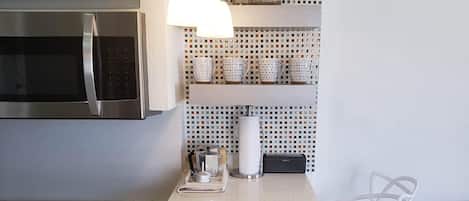 Fridge, microwave, stovetop, coffee/tea maker