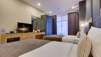 1 kamar tidur, seprai premium, minibar, dan brankas