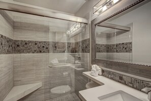 Combined shower/tub, hair dryer, towels, shampoo
