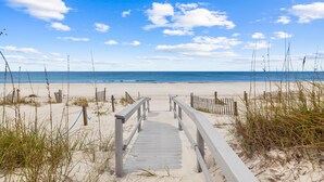 A wooden boardwalk leading to a sandy beach with a clear blue sky. - Cape Conchs: Large Beachfront Home, Private Pool, Sleeps 18, Pet Friendly (Cape San Blas)