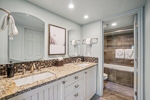 Bathtub, hair dryer, towels
