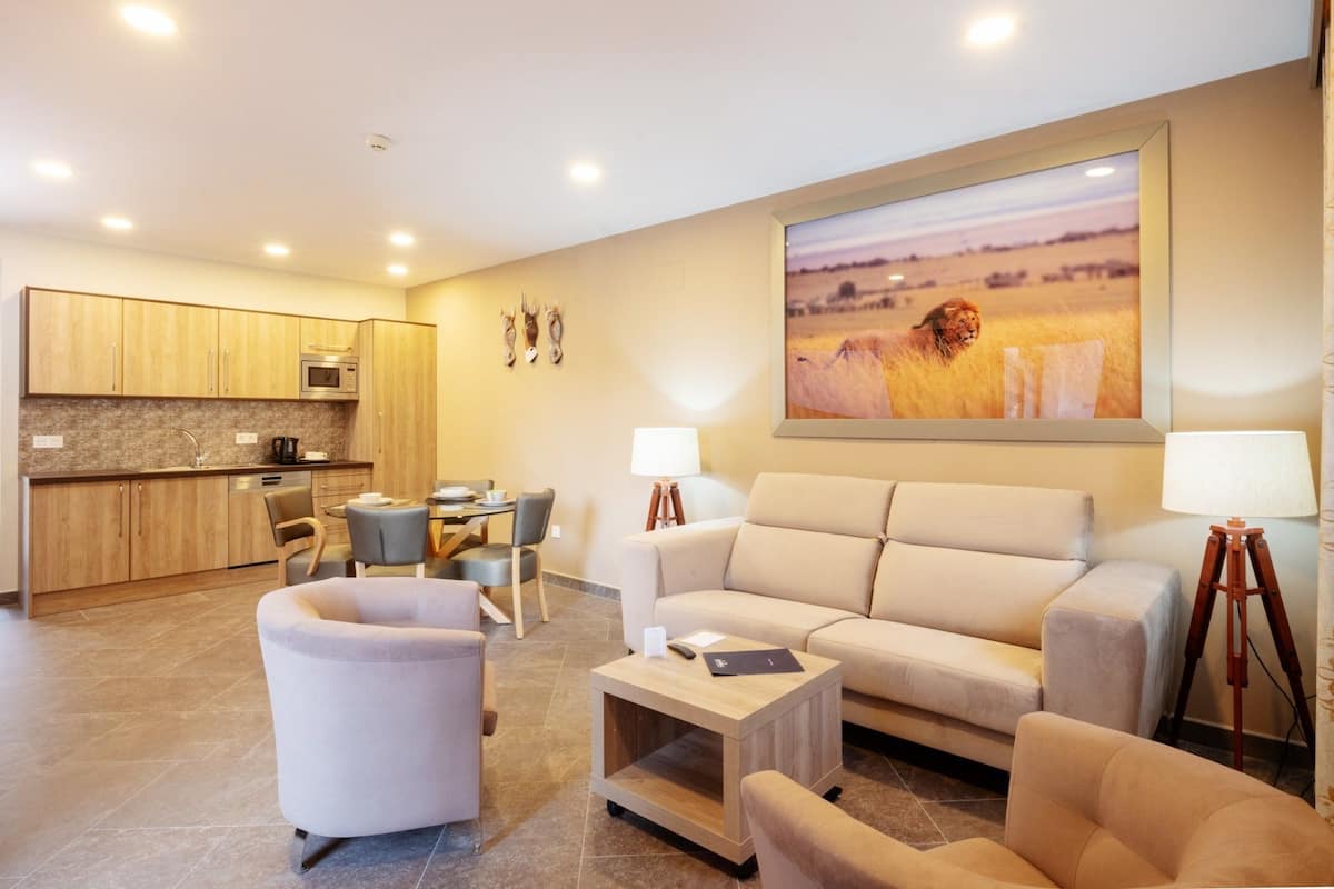 Junior Suite, Terrace | Living room | 40-inch flat-screen TV with cable channels, TV, streaming services