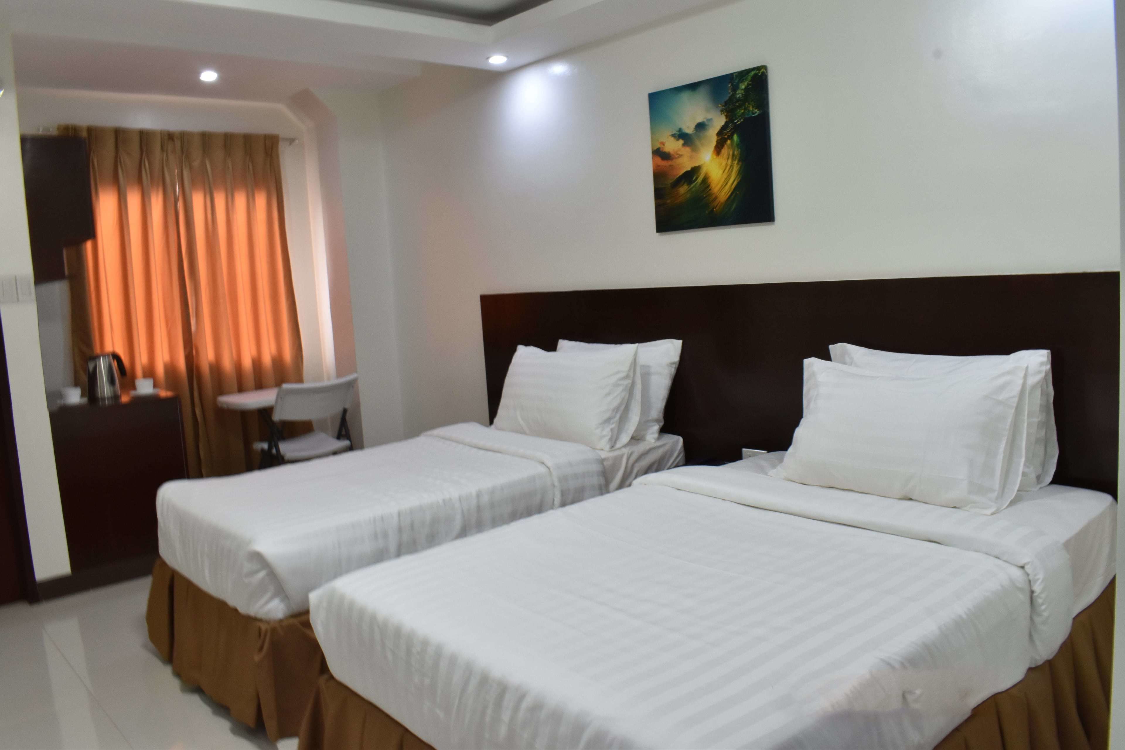 deluxe room | minibar, desk, soundproofing, iron/ironing board