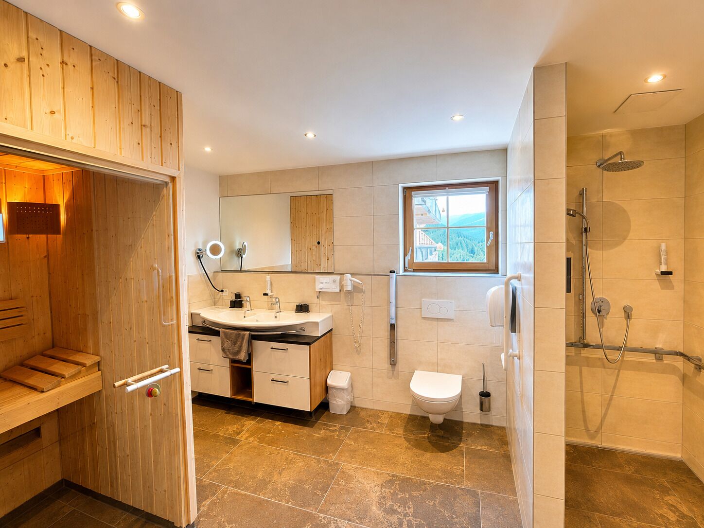 A modern bathroom with a wooden sauna, a large mirror, a window, and a shower.
