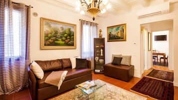 Standard Apartment | Living area | Flat-screen TV