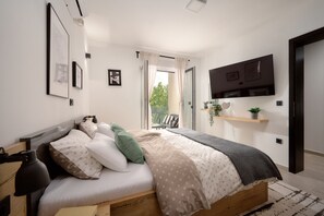 4 عدّة غرف نوم ومكواة/لوح كي وواي فاي مجانًا وملاءات أسرّة