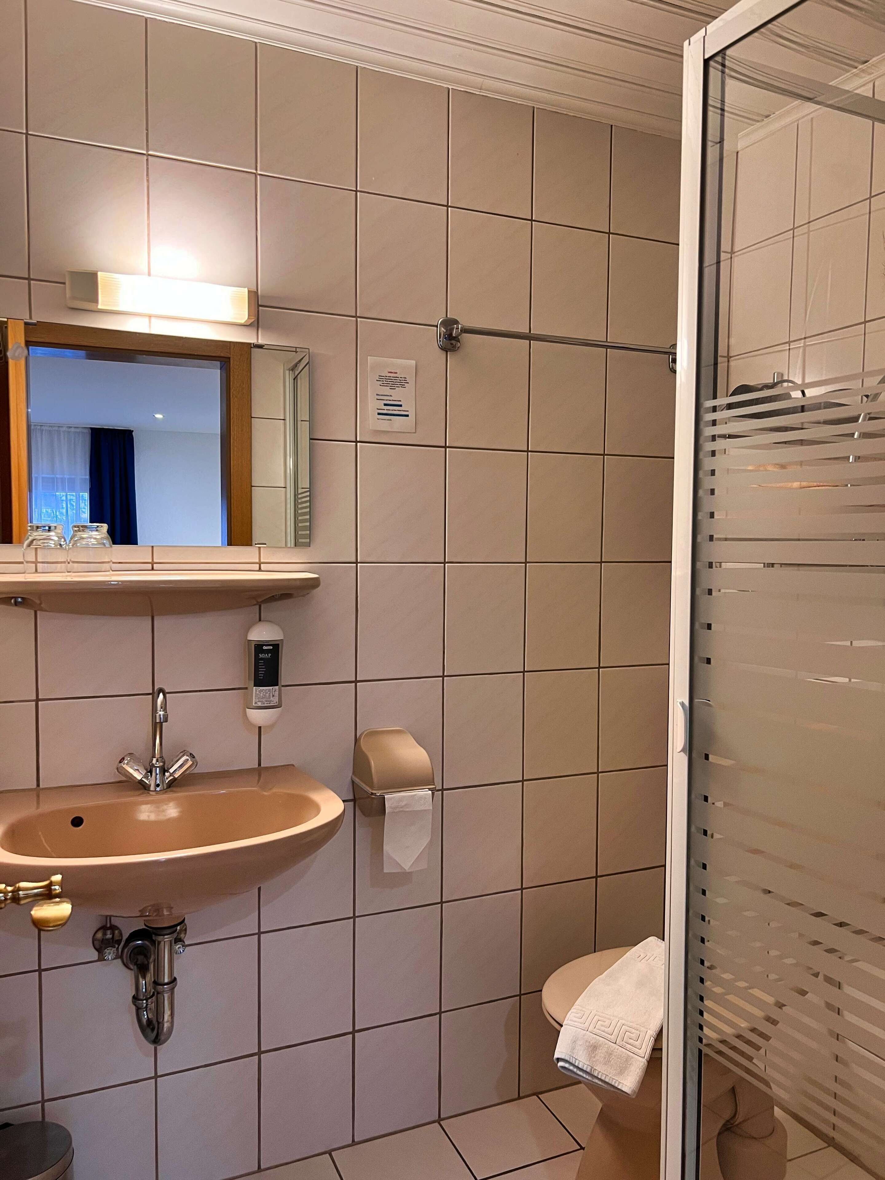 comfort double room, 1 king bed | bathroom | shower, hair dryer, towels