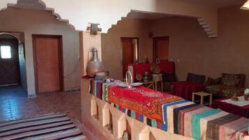 Breakfast, lunch, dinner served; local cuisine