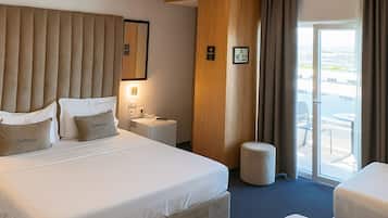Quadruple Room, Multiple Beds, Garden View | 1 bedroom, premium bedding, minibar, in-room safe