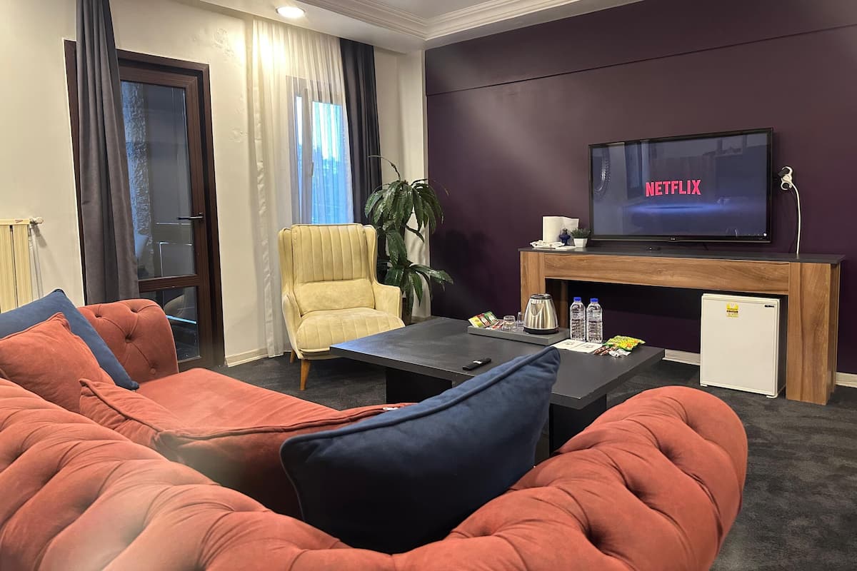 Chambre Deluxe, 1 grand lit, bain à remous, vue mer