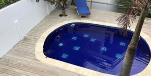 Outdoor pool, pool umbrellas, pool loungers