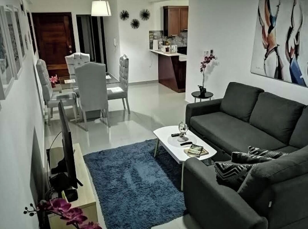 Basic House, 1 Queen Bed | Living area | Flat-screen TV