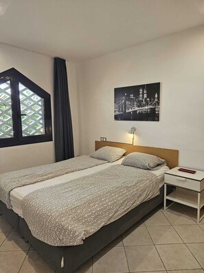 4 bedrooms, in-room safe, iron/ironing board, free WiFi