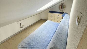 2 habitaciones y ropa de cama