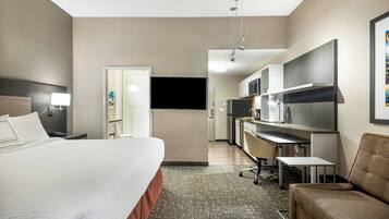 Desk, laptop workspace, blackout curtains, iron/ironing board