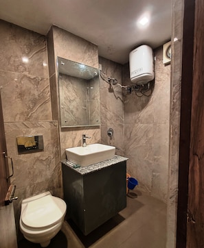 Shower, free toiletries, towels, soap
