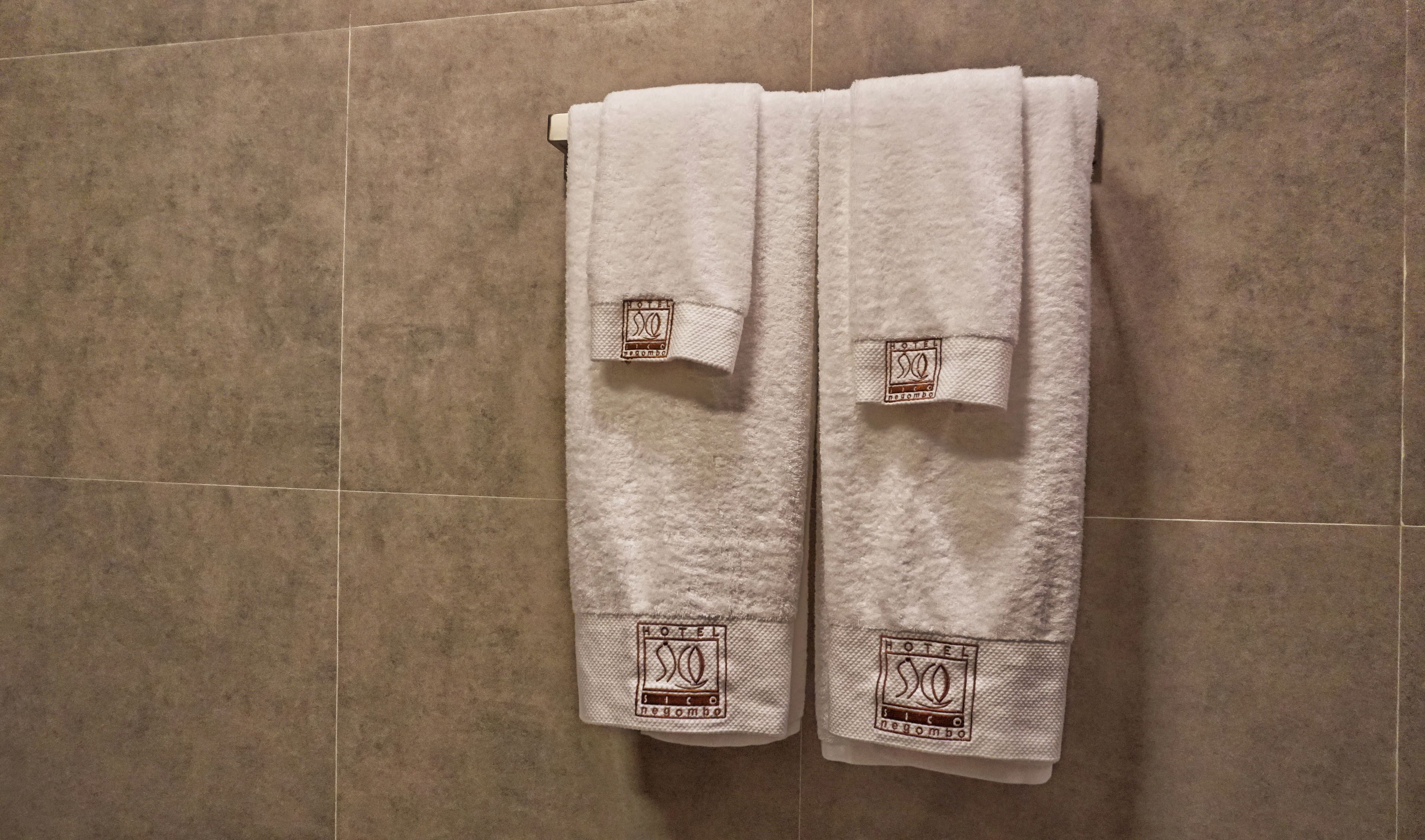 shower, free toiletries, bathrobes, towels