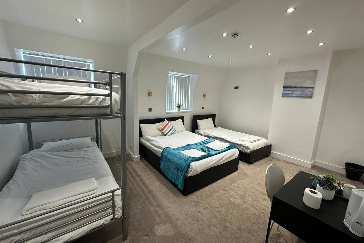 Family Quadruple Room, Multiple Beds, Ensuite | WiFi (free), individually decorated, individually furnished, bed sheets