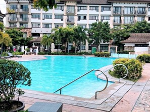 Outdoor pool - 1 Bedroom Deluxe Condo at Apartelle D' Oasis (Davao)