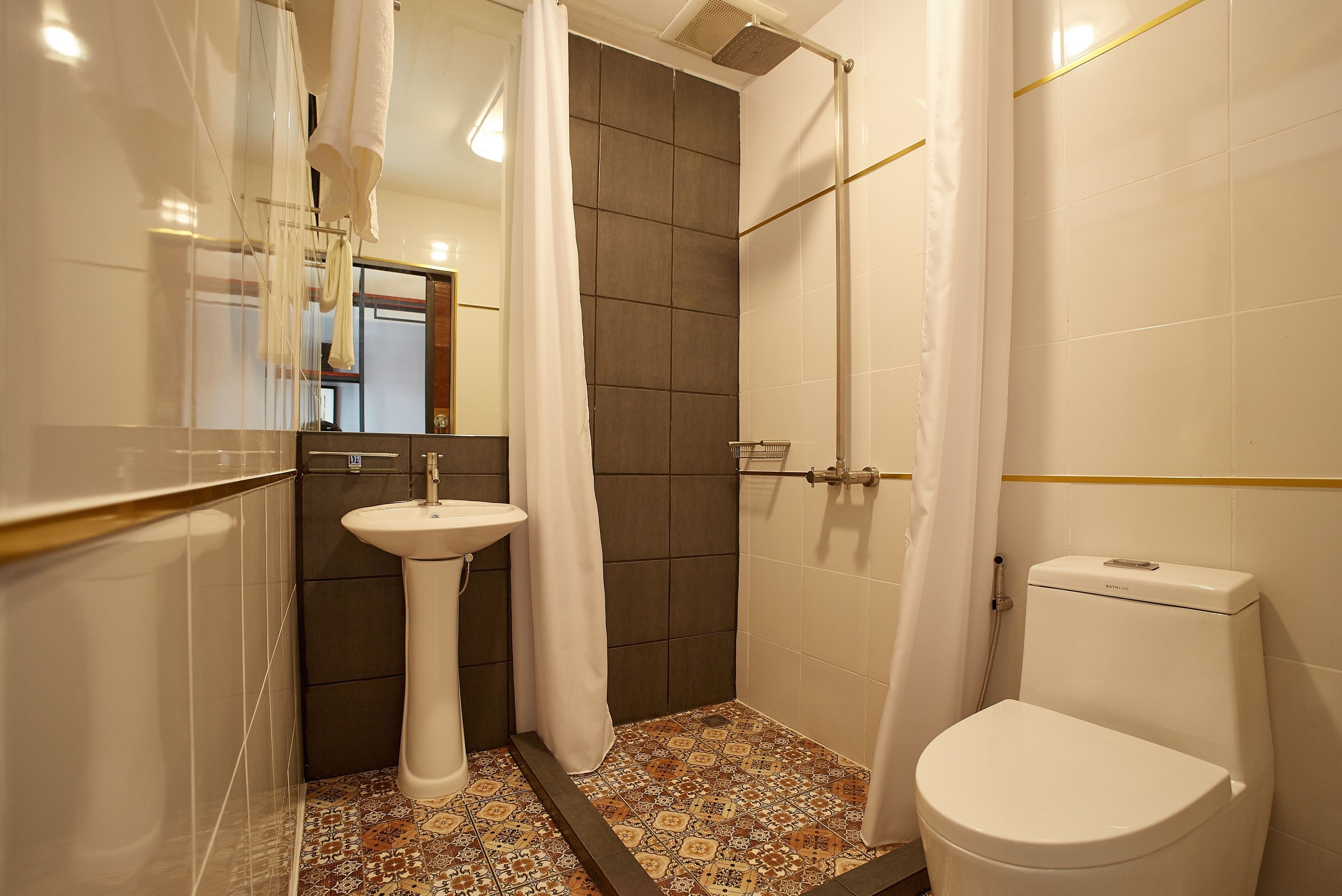 shower, rainfall showerhead, hair dryer, towels