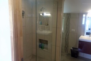 Bathtub, hair dryer, towels, soap