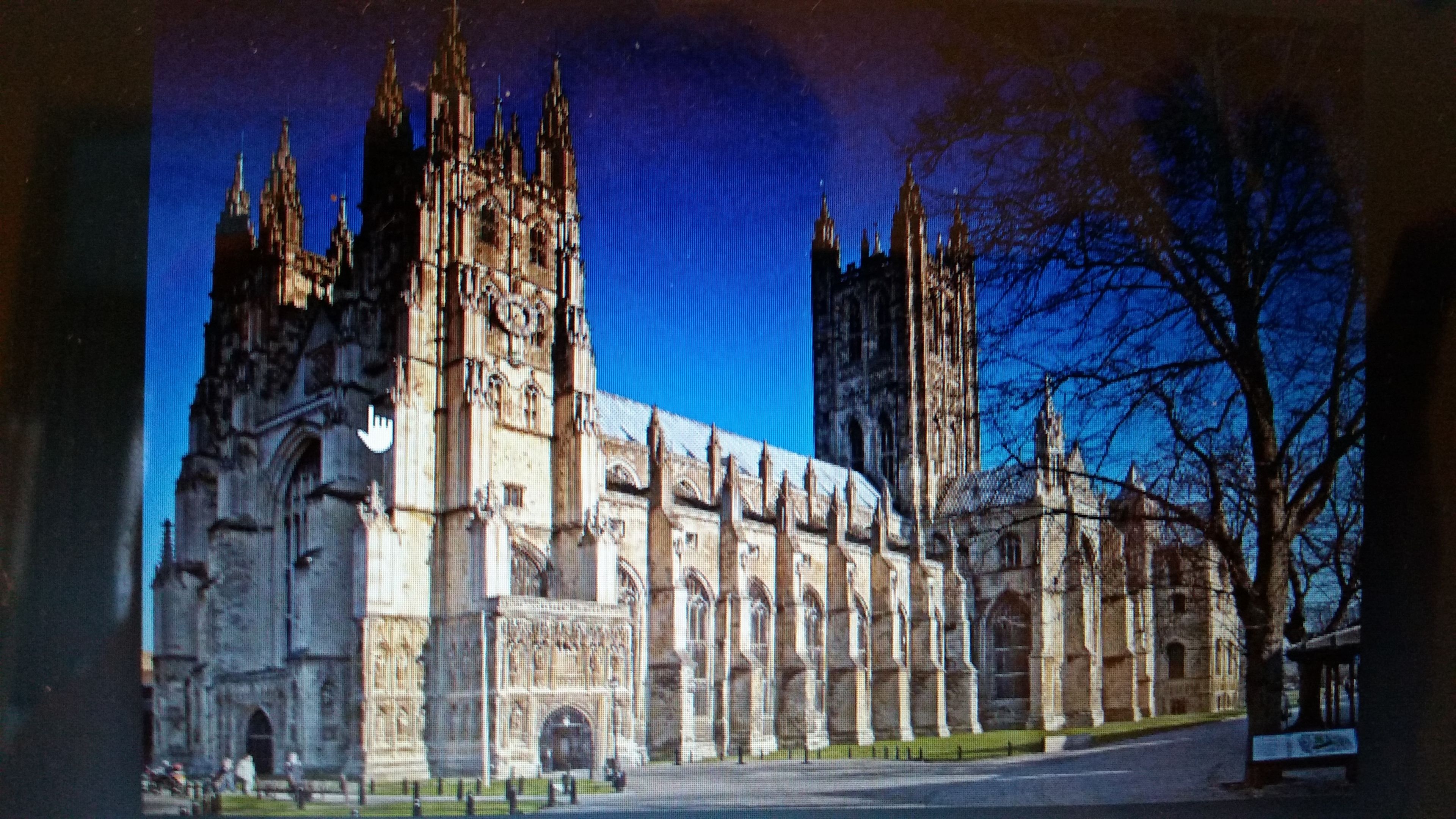 A large Gothic-style cathedral with multiple spires and intricate stonework.