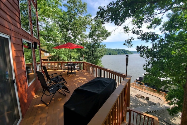 Shaded upper deck with lounge seating.