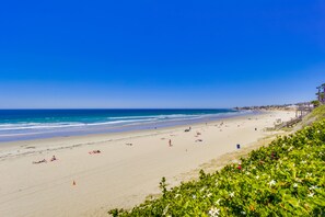 On the beach, sun loungers, beach towels