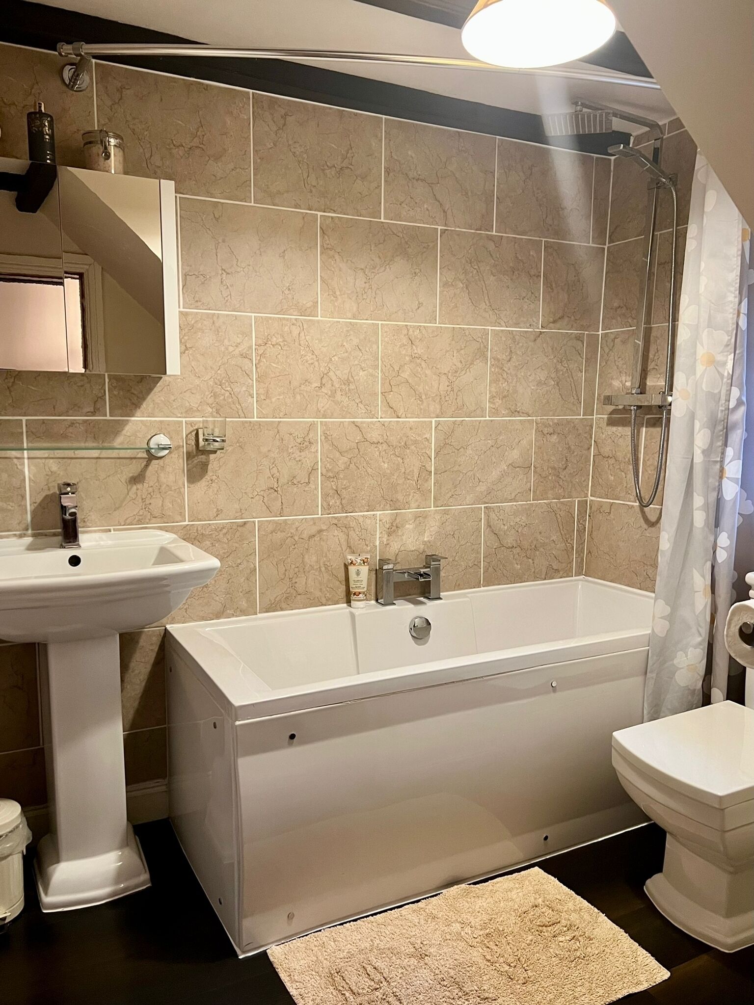 Combined shower/bathtub, hair dryer, towels, soap