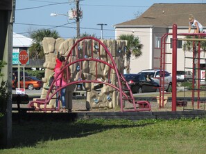 Kids can play on the outdoor climbing structure.