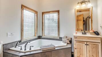 Shower, jetted tub, hair dryer, towels