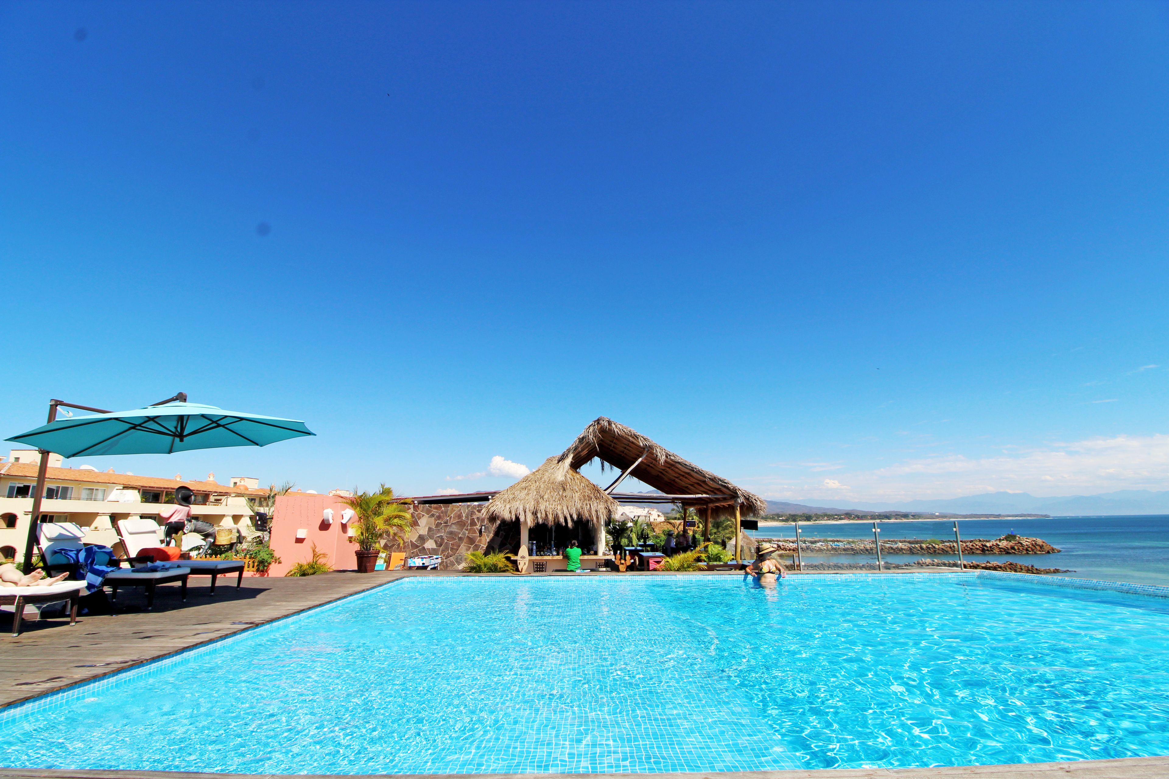 2 outdoor pools, open 9 AM to 9 PM, pool umbrellas, sun loungers