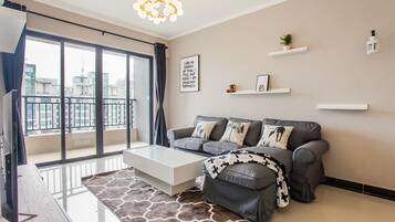 Family Room, 3 Bedrooms | Living area | Flat-screen TV