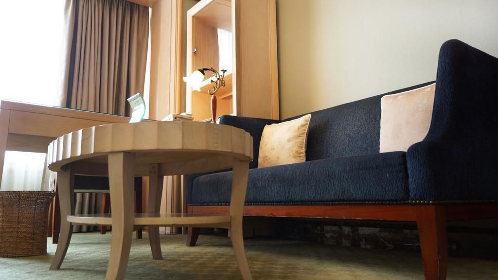 executive twin room | living area | 43-inch lcd tv with cable channels, tv