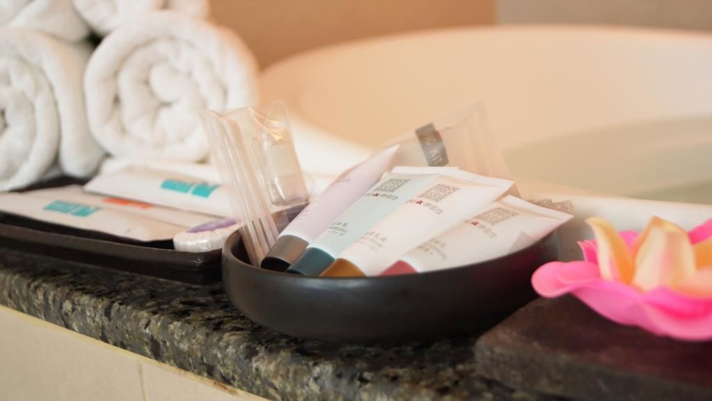 honeymoon suite | bathroom amenities | hair dryer, slippers, bidet, towels